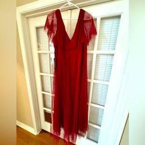 Crimson tulle gown with deep V